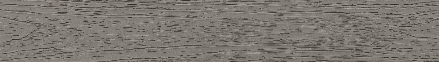 A single gray capped composite deck board with an embossed wood grain texture