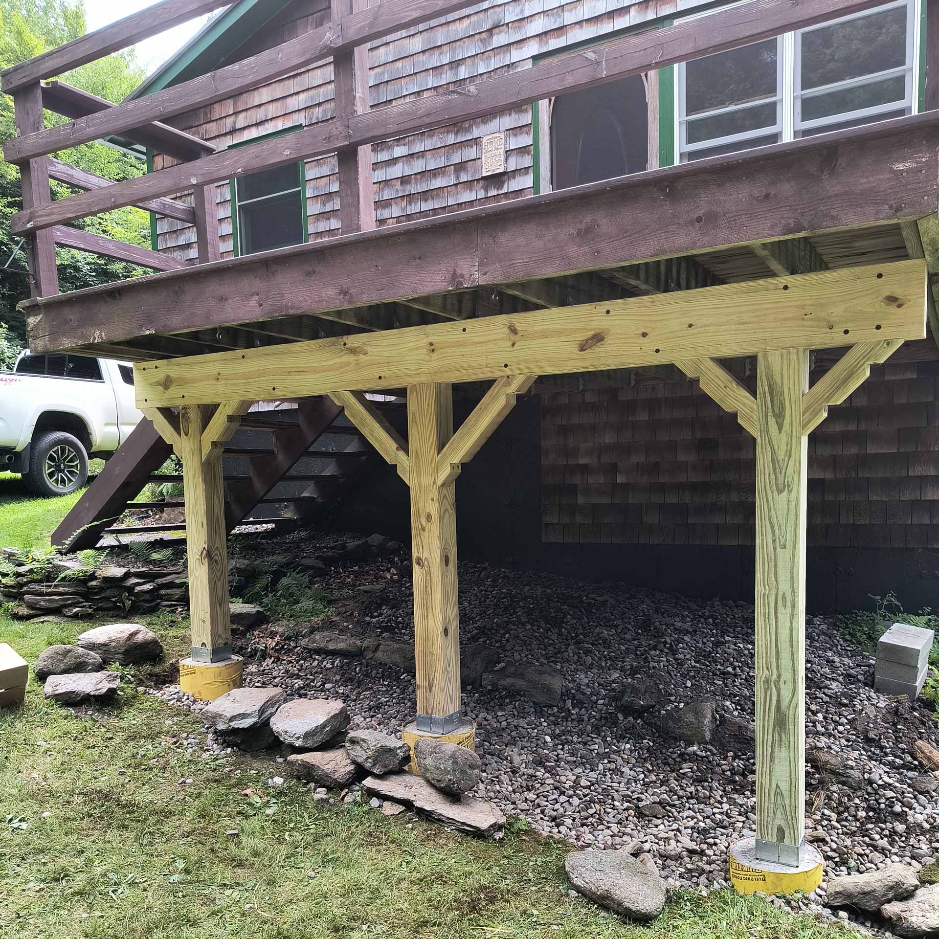 Deck with newly installed reinforced supports